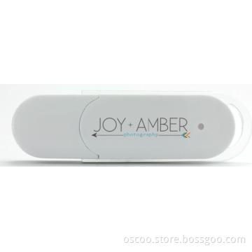 White slim usb with keyring attached